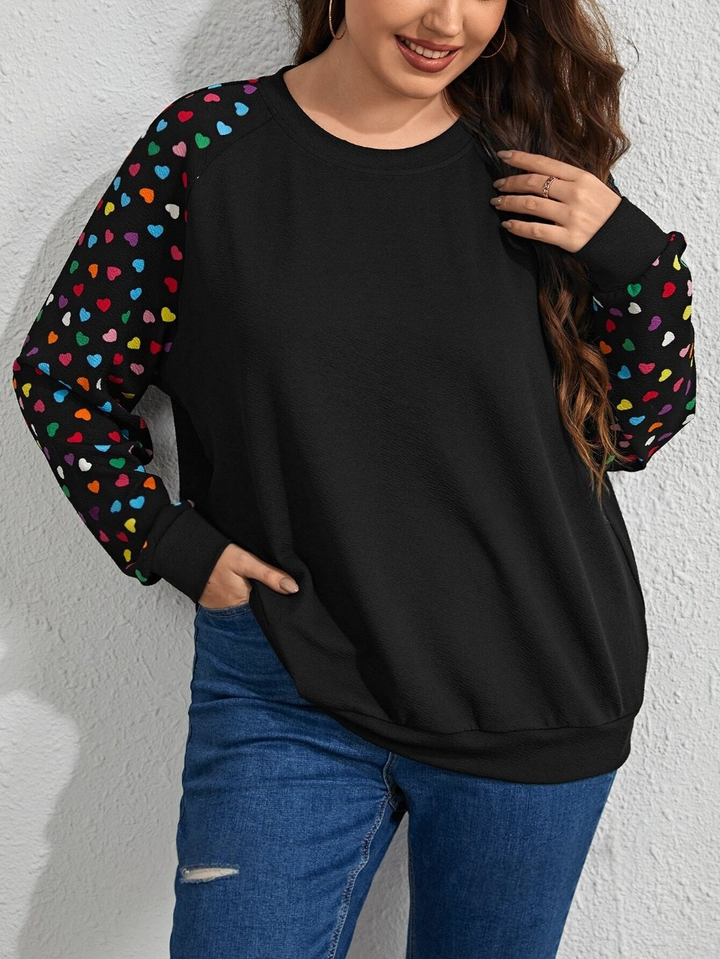 Sweatshirts mit Raglanärmeln und Herz-Print in Übergröße