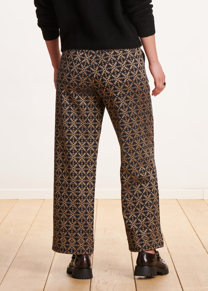 Gerade geschnittene 7/8-Hose aus schwarzem und goldenem Jacquard